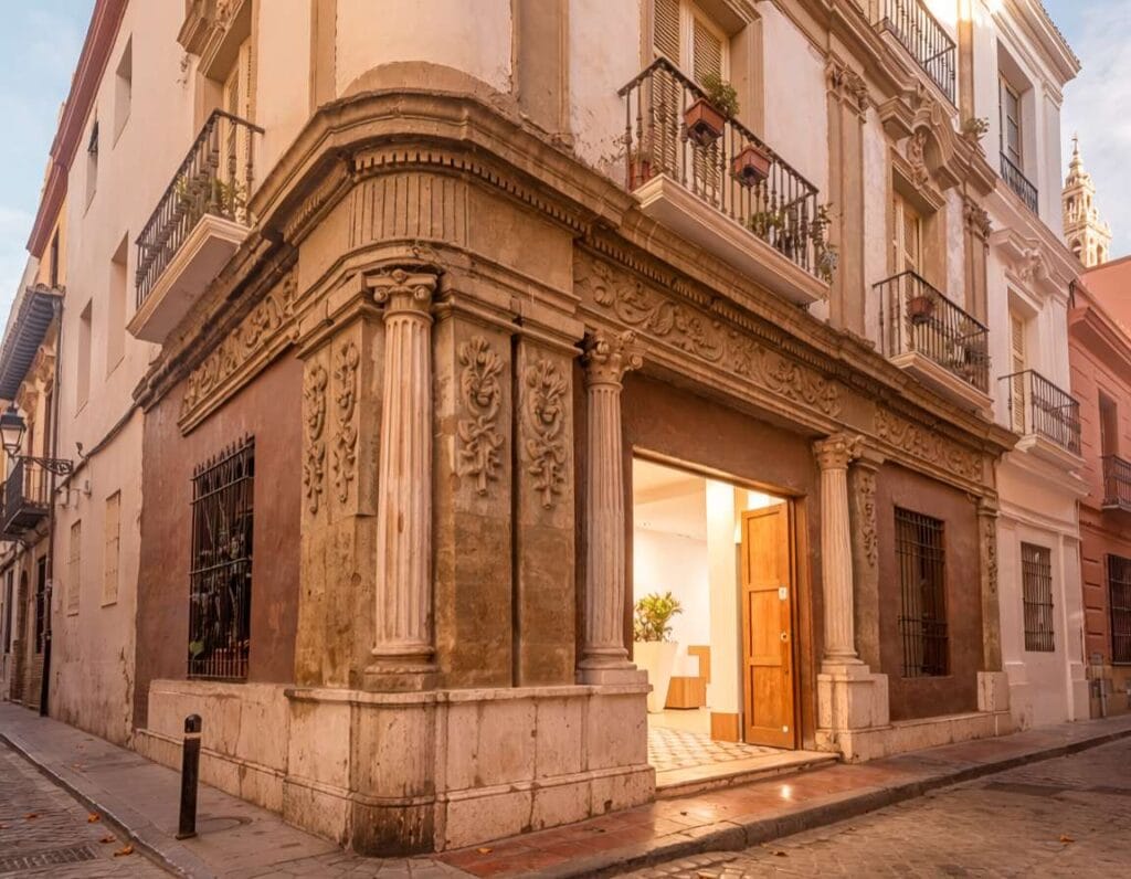 Petit Palace Canalejas Sevilla to niedrogi hotel w Sewilli. Zdjęcie wygenerowane przez AI.