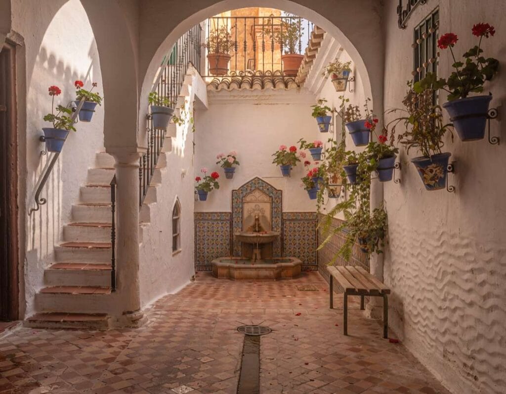 Hostal La Fuente to niedrogi pensjonat w centrum Kordoby. Zdjęcie wygenerowane przez AI.